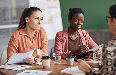 Women meeting and discussing work