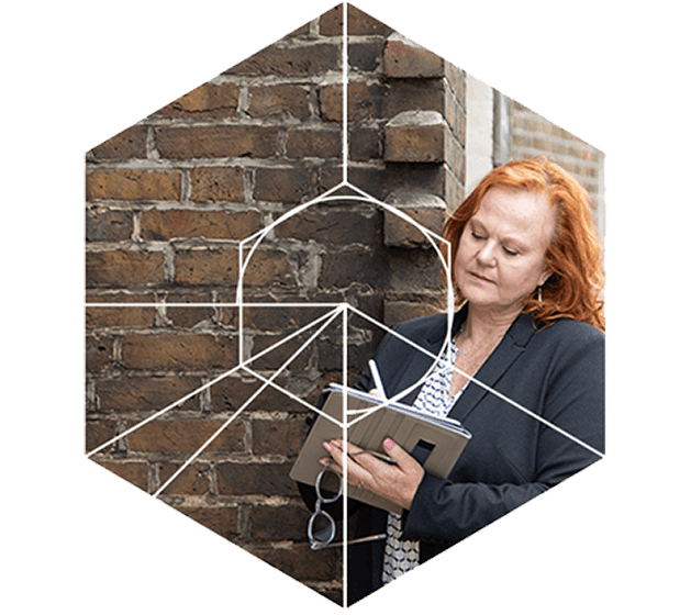 Alison Stone surveying a property